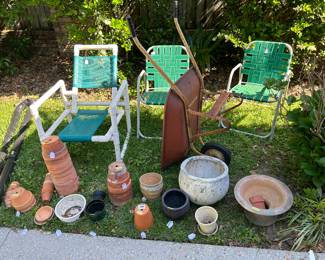 Lawn crockery - note the pair of vintage chairs!