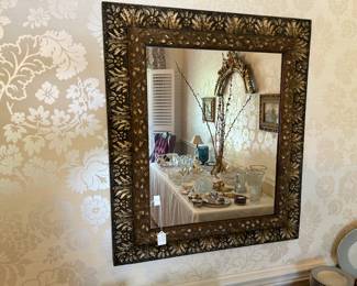 Contemporary mirror in an aged design
