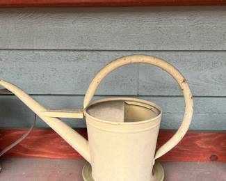 Yellow Metal Watering Can