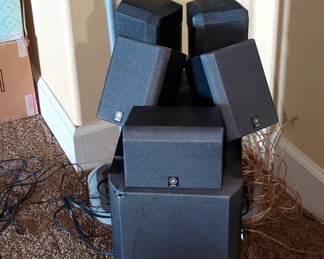 Yamaha 9 Speaker System Including 6" Speakers, Qty 5, 2 On Stands, 8" Speakers, Qty 3, 16" Speaker, And Bar Speaker