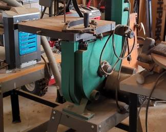 Grizzly Industrial Inc 14" Electric Band Saw, Model G1019Z, 43" Tall, On Metal Stand, 23.5" x 19" x 24", With Manual And Assorted Instructional VHS Tapes