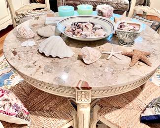 Breakfast table marble top. Vast collection of a variety of sea shells. Starfish, coral. Fragrant bars of soap in box. 