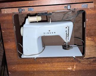 Singer sewing machine built in table