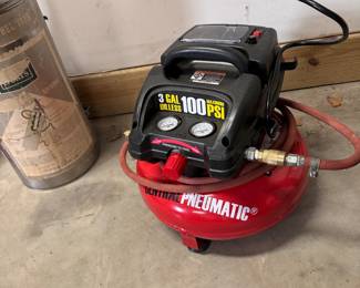 Central Pneumatic 3-gallon air compressor with hose, works 