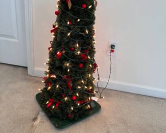 Custom-made outdoor Christmas tree (no topper), body is a large painted rubber traffic cone 30"H