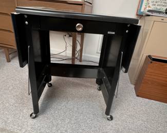 Cole black metal work table with drop sides, mild wear 27"H, 34"W when fully open, 19"W when sides down, 17"D