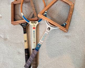 Three wooden tennis racquets 