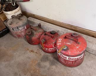 Group of 4 vintage metal gas cans