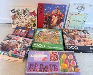 Puzzles, Muppets, Geddes, ET, appear intact, pieces not counted