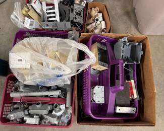 Small containers and boxes of electrical fittings