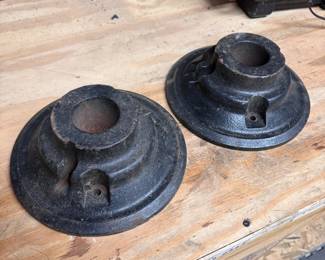 Cast iron parts, likely tractor wheel weights 9"W with 2" opening in top