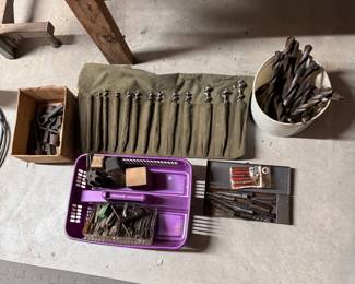 Assortment of drill bits, most are very large