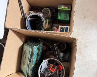 Two boxes of a variety of nails, screws and hardware