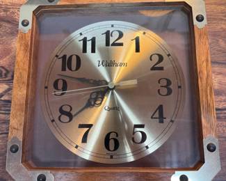 Waltham battery-operated wall clock with wood frame 10"