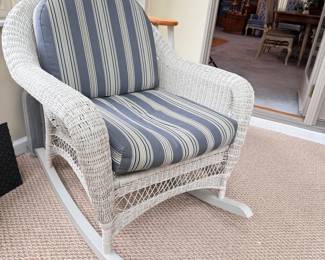 Woven vinyl patio rocker with blue striped cushions 34"H x 30"W, comes with extra back cushion