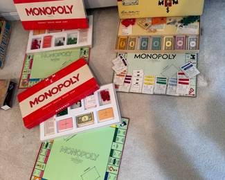 The Monopoly lot with two 1961 Great Britain (1 has sealed game pieces) and one vintage USA (1946)