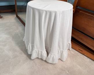 Round pressboard table with cloth 23"H x 19"W