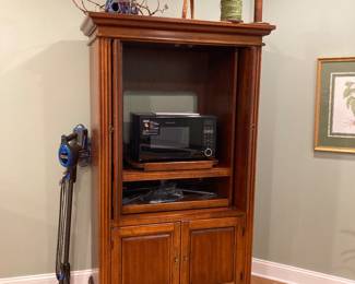 Entertainment center and microwave