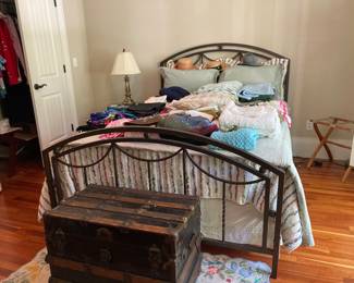 Double bed and antique trunk