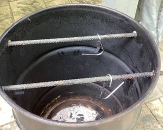 Barrel Smoker open with two hangers