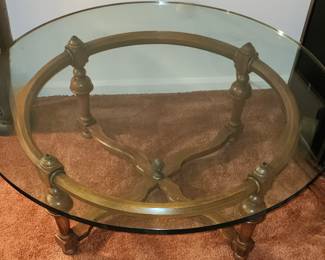 Vintage French Provincial solid wood cocktail table with gkass top.
Rare find.