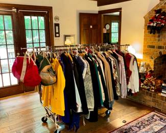 Loaded rolling rack of ladies clothing