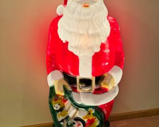Vintage Empire 46” blow mold Santa (there is a small hole on his cap)