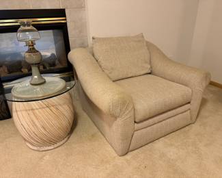 Upholstered club chair that coordinates with large sofa sectional