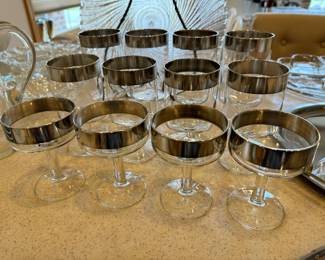 Set of 12 Dorothy Thorpe decorated crystal stemware with sterling silver band