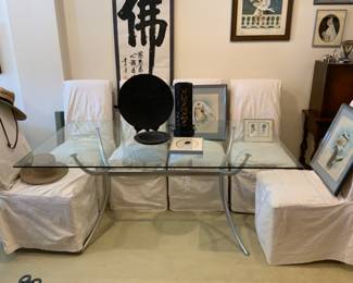 Glass top dining table, metal base, upholstered bishop chairs