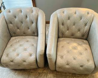 2 Leather swivel chairs