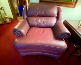 Leather chair with nailhead trim and matching ottoman
