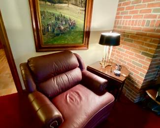 Leather chair with nailhead trim and matching ottoman