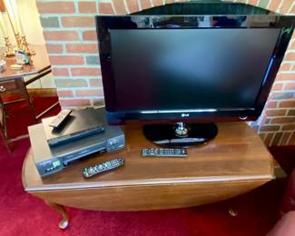 LG TV with remote and DVD player