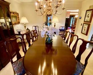 Oval dining table and eight chairs by Ethan Allen. Two arm chairs and 6 side chairs.