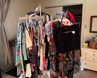 Lots of women’s clothes - many with tags