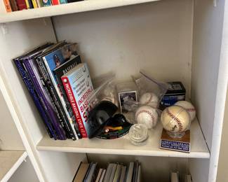 Rockies books and baseballs 