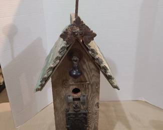 Birdhouse decor with antique hardware. 24 inches tall.