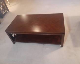 Coffee table. 18 x 48 x 26. Located in basement. Matches lots 1008 and 1009
