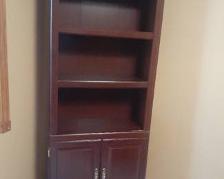 Book shelf with bottom storage. 71 x 30 x 13. Located in basement