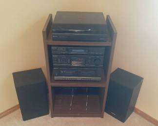 Panasonic home stereo system. AM FM radio, cassette player and turn table with speakers. 31 x 18.5 x 14.5. Located in basement