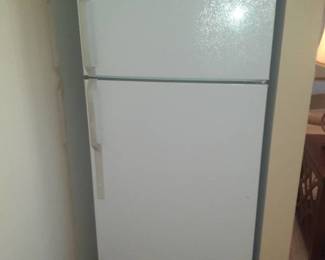 Hot Point refrigerator. 64 x 28 x 34. Located in basement