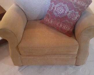 Havertys over sized chair with throw pillow. Wheat colored. Located in basement Matches lot 1000