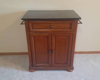 Crosley Furniture Co. cabinet. One drawer with bottom storage. 34 x 32 x 18. Located in basement
