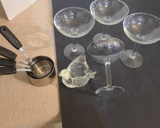 Chambord glasses, Avon votive holder, stainless measuring cups