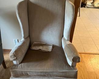 Tan wing back chair