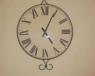 Large wall clock. 33 x 24. Located in basement