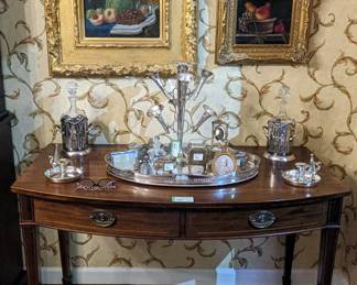 One of the pair of magnificent antique English mahogany console tables, with two drawers, pencil inlay detail on Marlborough legs, three pair of artist-signed original oils on canvas, all still life fruit, wth sterling and silver plated items. 