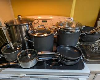 Nice collection of anodized aluminum cookware, with lids that actually match, along with a square Griswold cast iron skillet, wth glass lid - rare as hen's teeth!