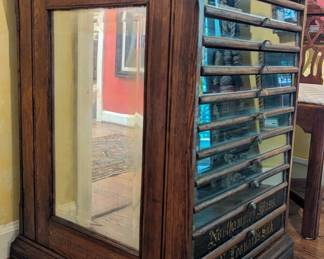 Side view of the J.N. Leonards spool cabinet. 